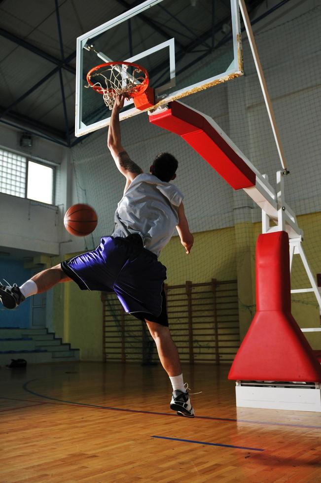 basket ball game player at sport hall photo