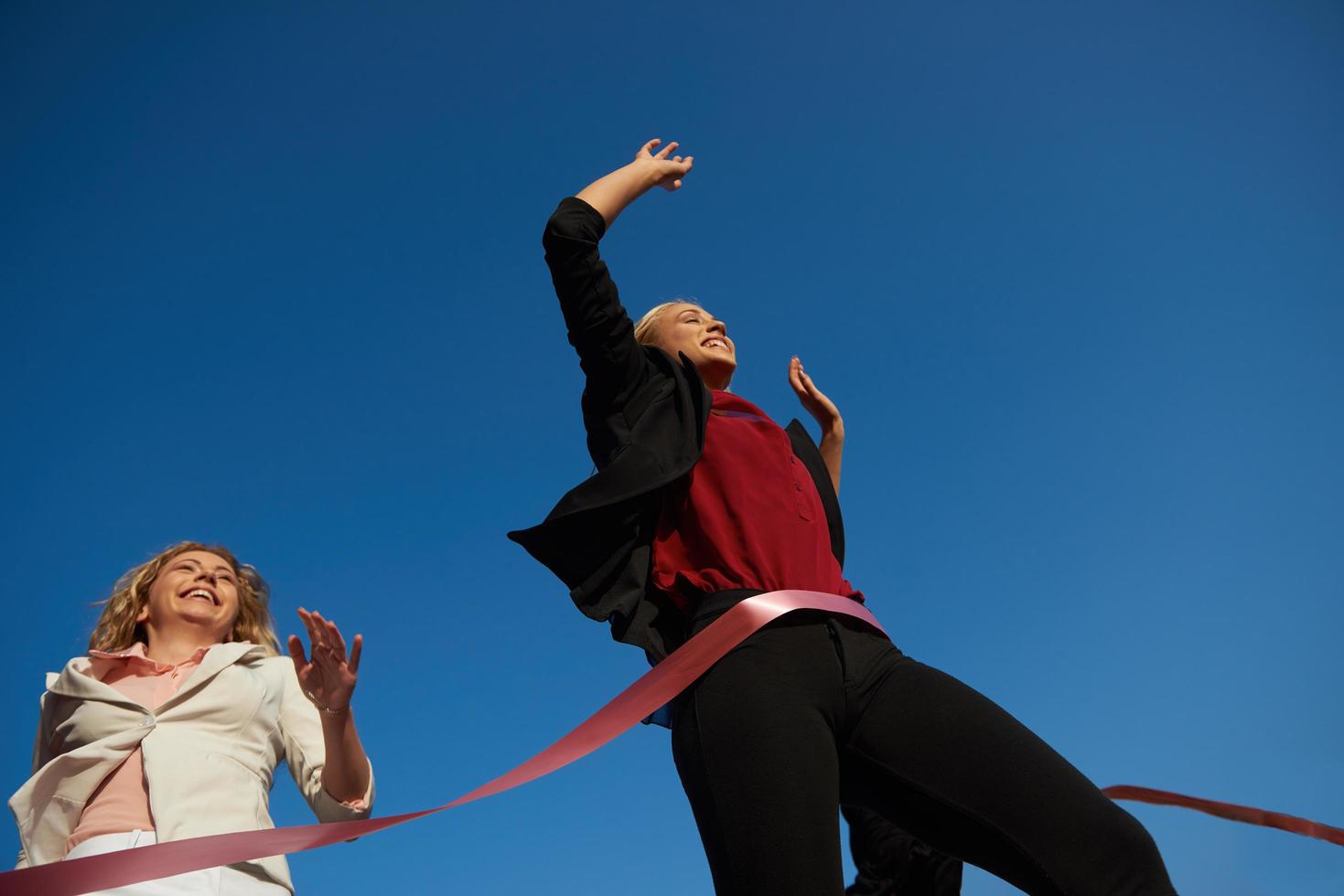 business people running on racing track photo