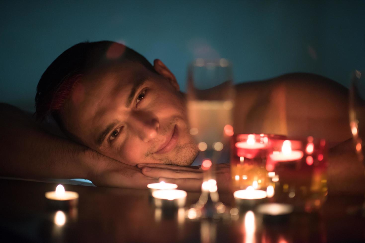 man relaxing in the jacuzzi photo