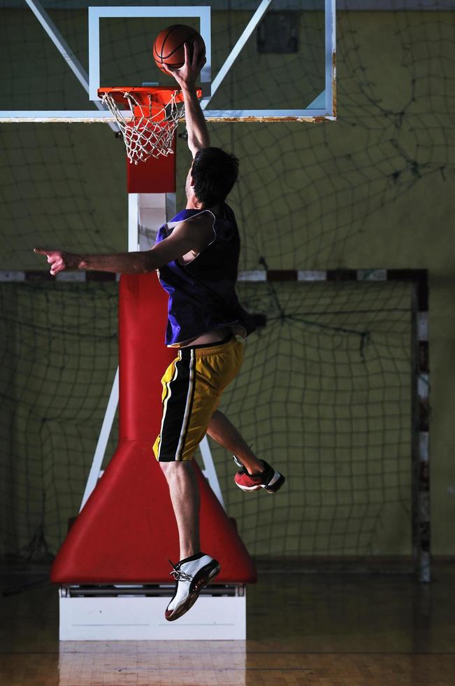 basket ball game player at sport hall photo