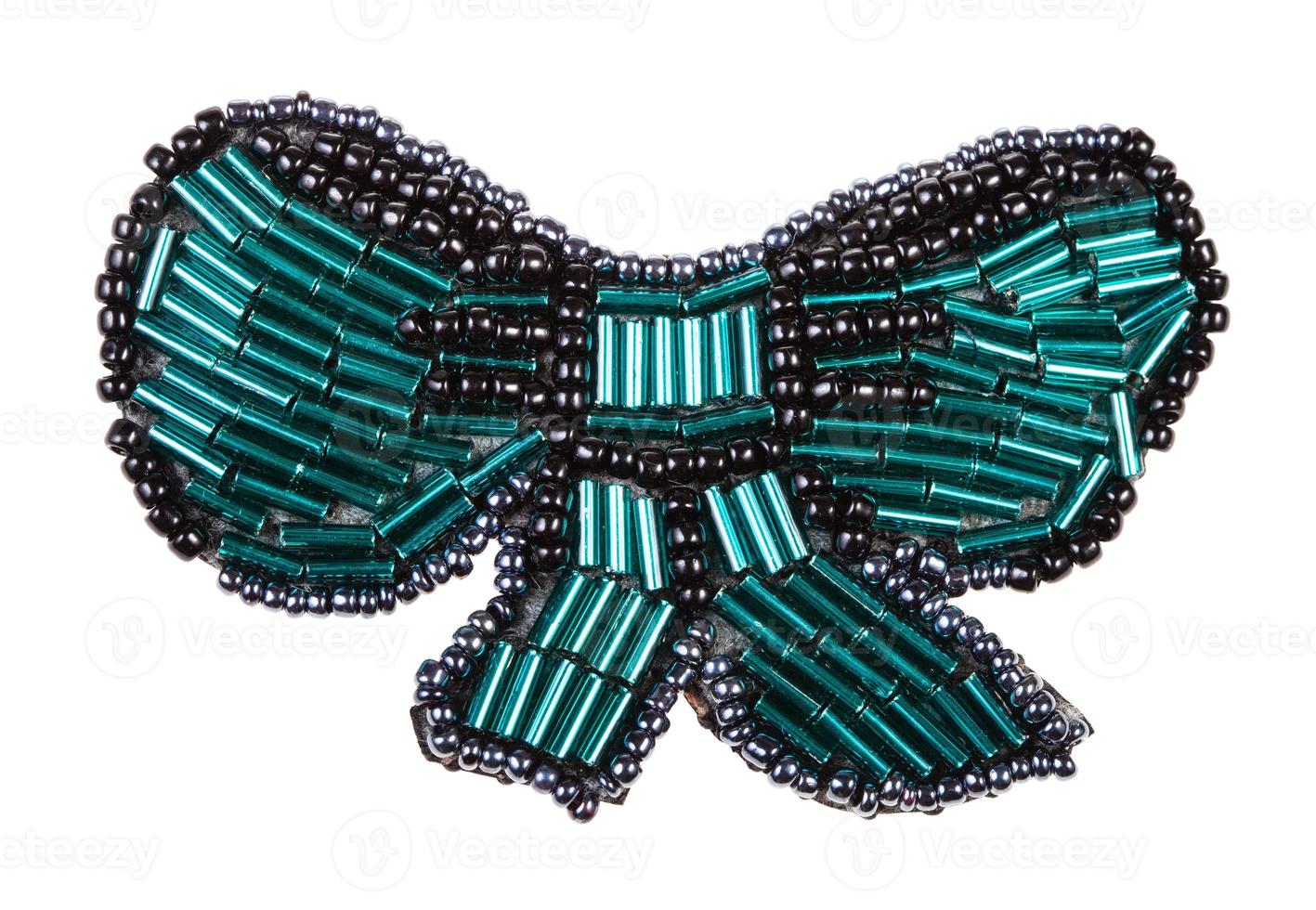 bow tie shaped brooch from glass green bugles photo