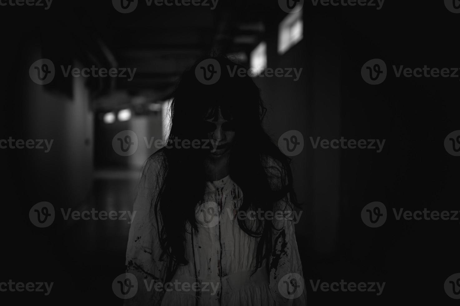 Portrait of asian woman make up ghost,Scary horror scene for background,Halloween festival concept,Ghost movies poster photo