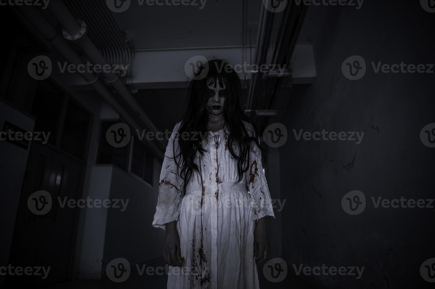 Portrait of asian woman make up ghost,Scary horror scene for background,Halloween festival concept,Ghost movies poster photo