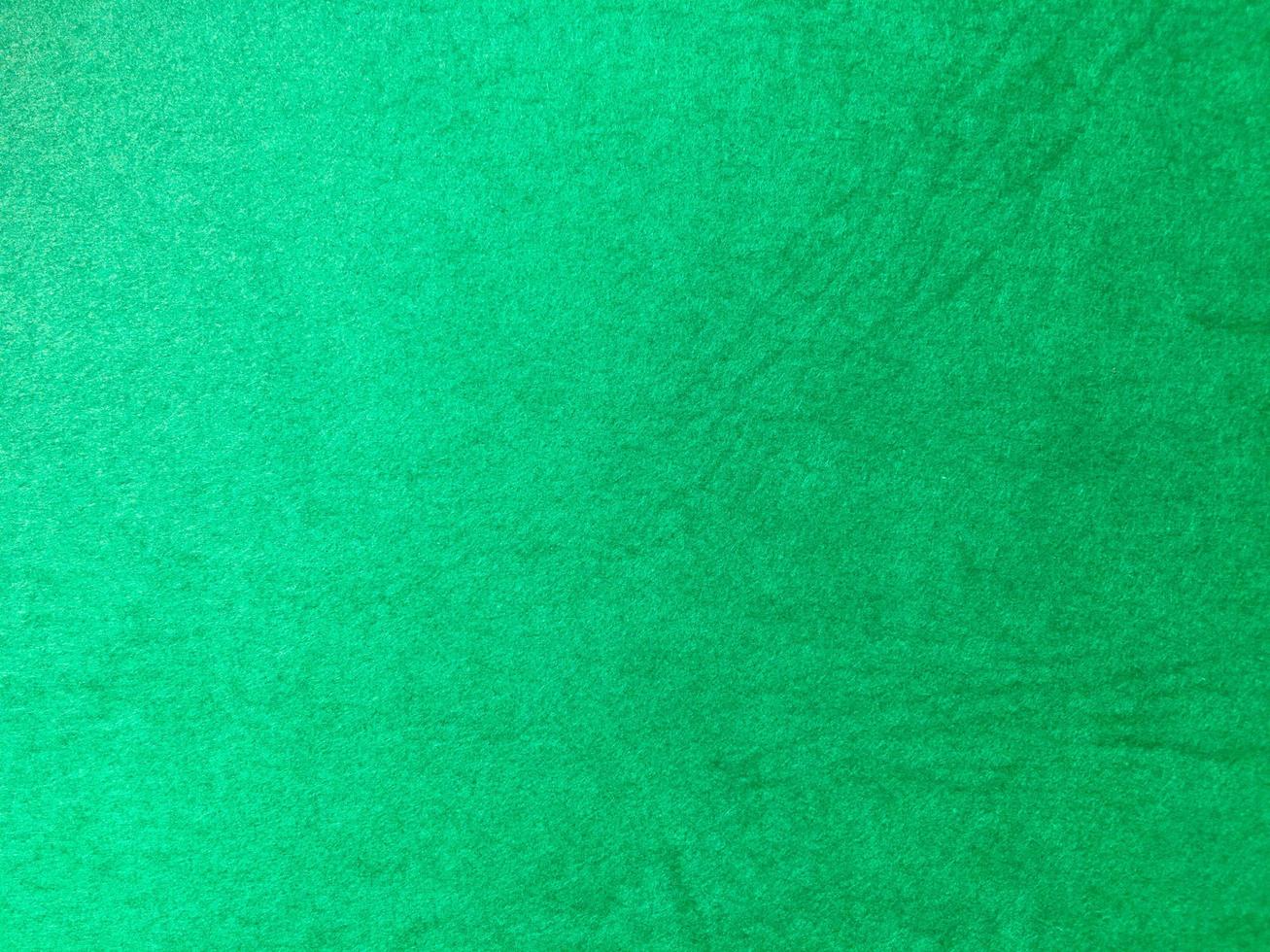 Green paper texture background with pattern for design. Copy space for text and work photo