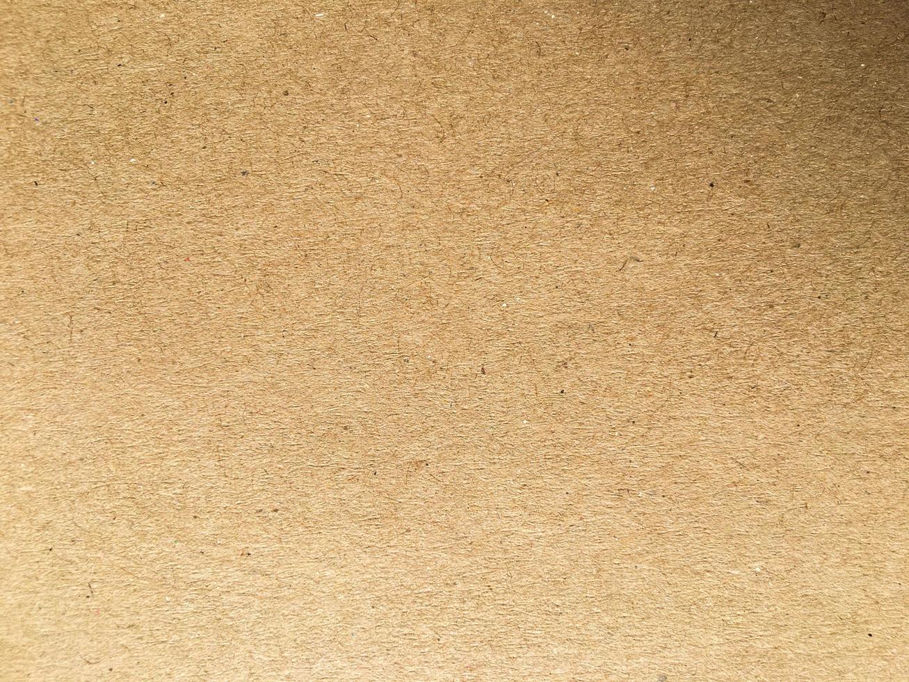 Old brown paper texture background or cardboard with copy space for design. photo