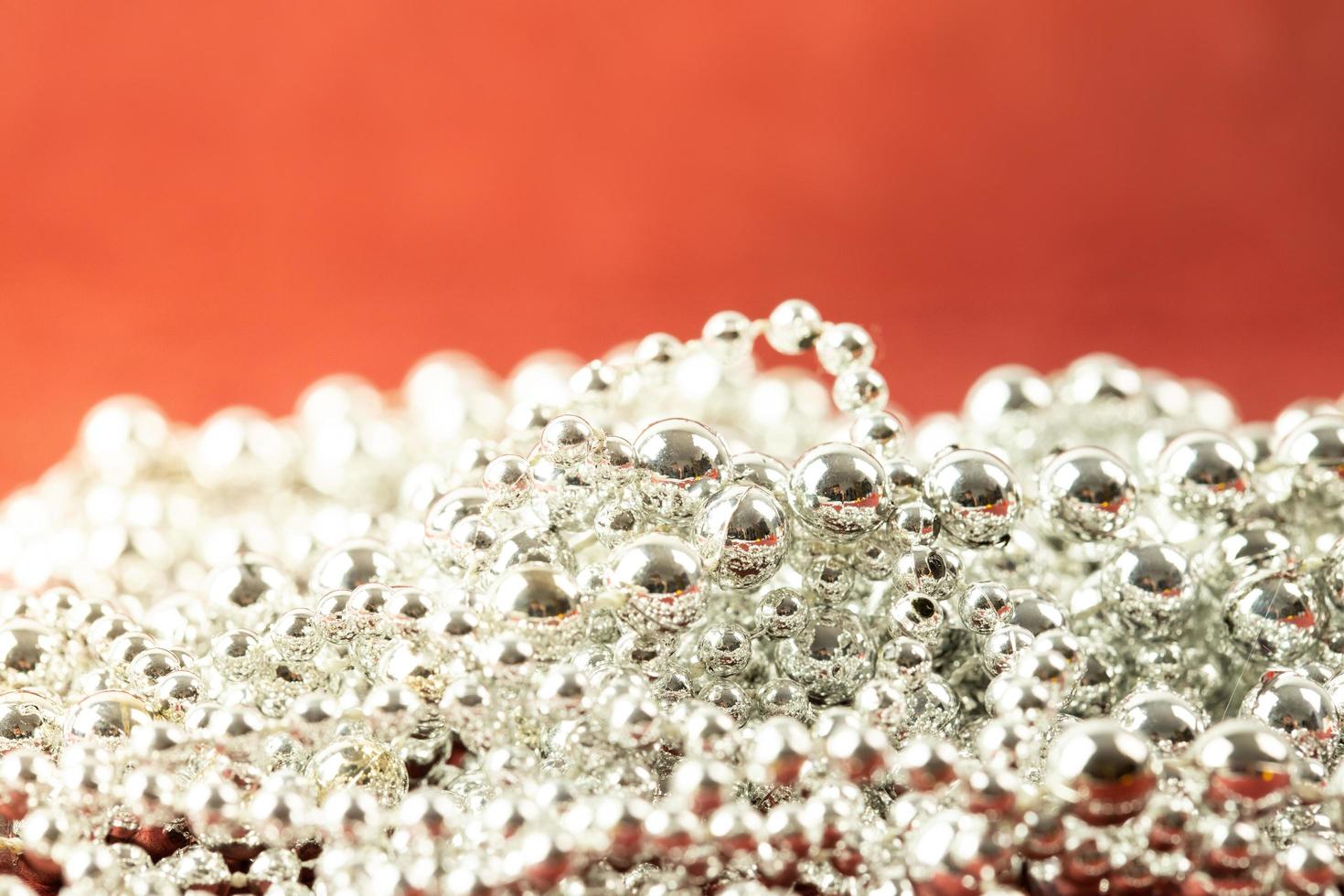 Shiny Christmas chain. Christmas banner on a red background photo