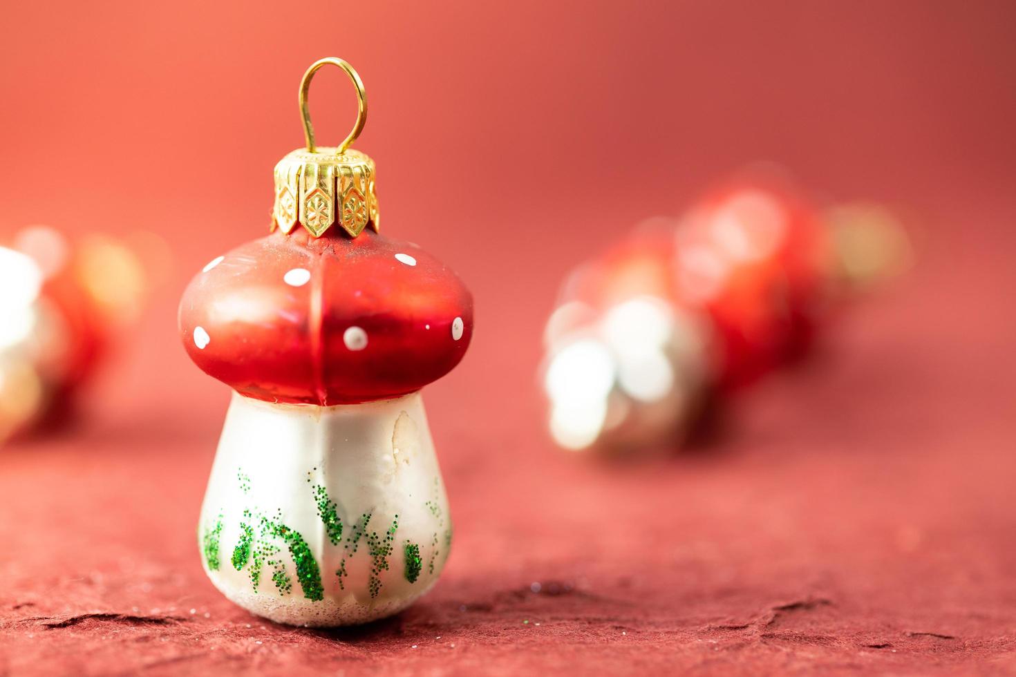 Christmas bauble on a red background. Festive banner. photo