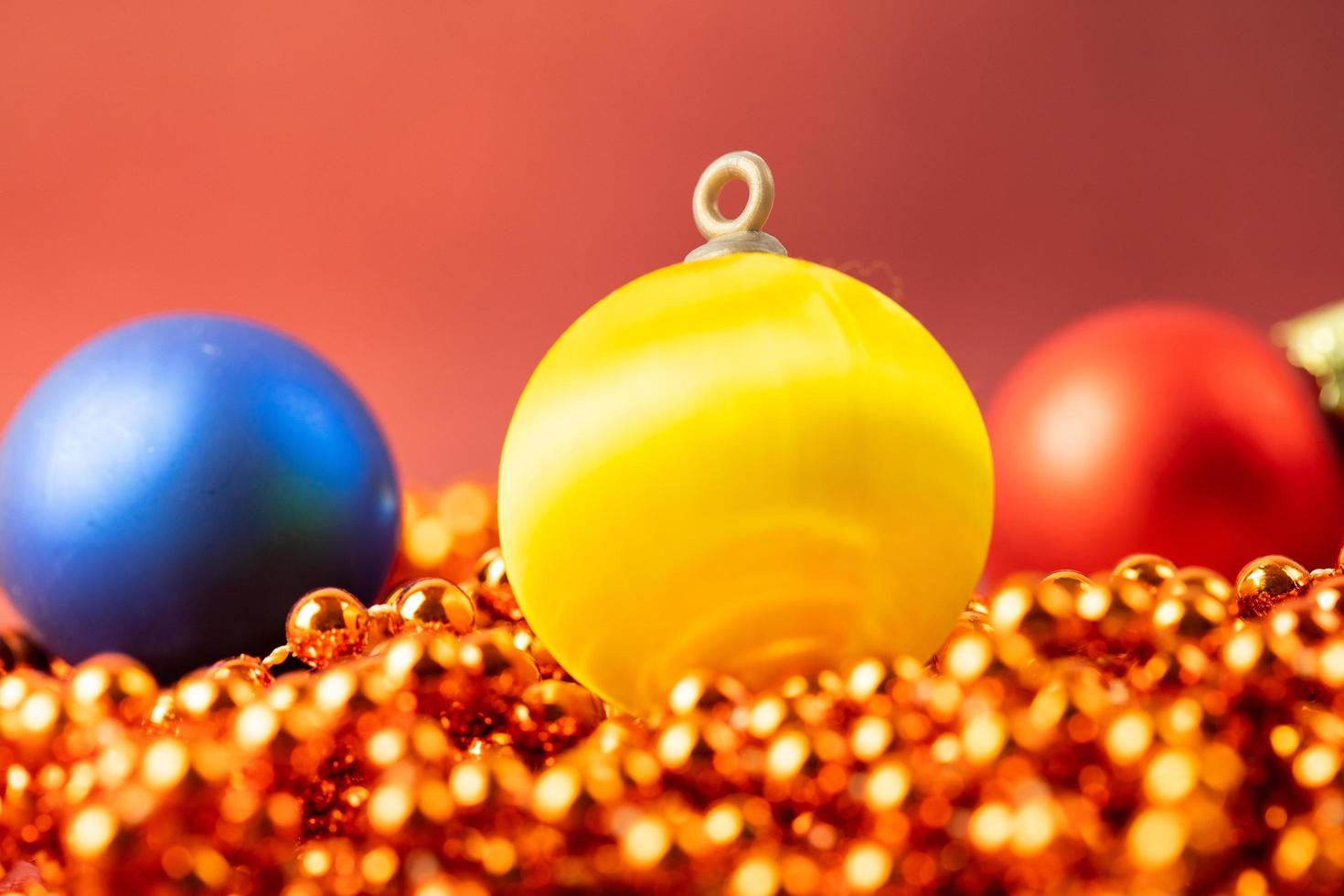 Christmas baubles on a red background. Christmas concept photo