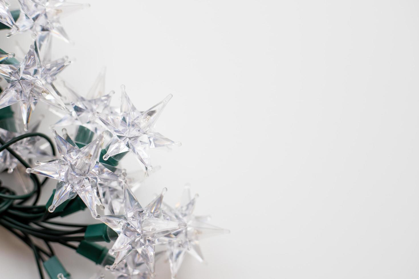 Christmas tree lights in the shape of a star on a white background photo