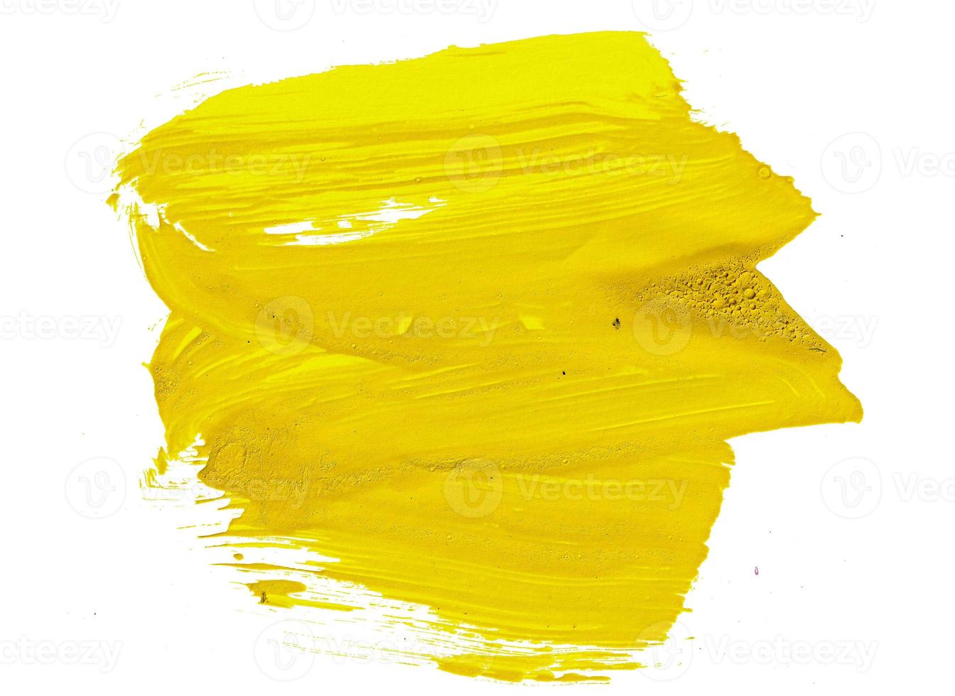 trazos de pintura acrílica amarilla para elementos de diseño. pinceladas artísticas para adornos y tercios inferiores de fondo aislado foto