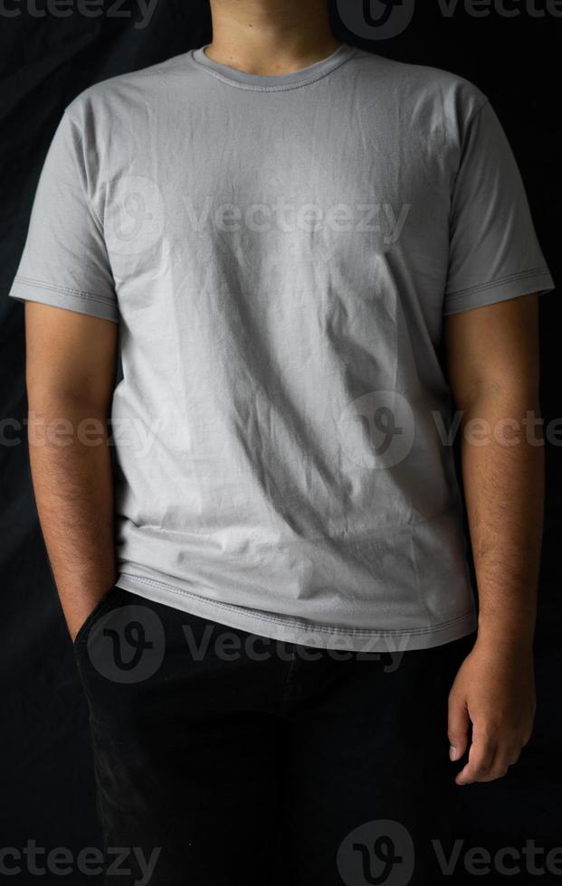 men wear plain T-shirts for mockups templates. blank t-shirt for front side design photo