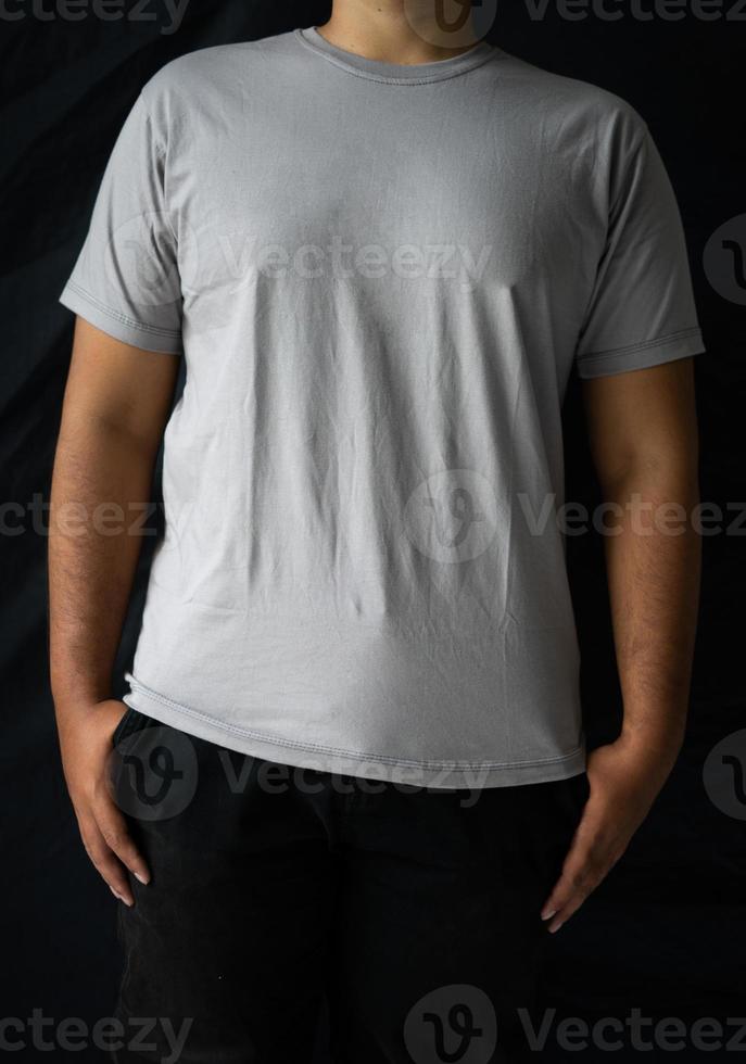 men wear plain T-shirts for mockups templates. blank t-shirt for front side design photo