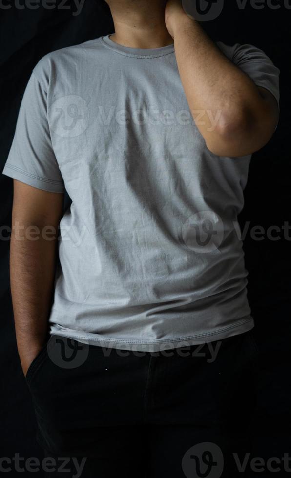 men wear plain T-shirts for mockups templates. blank t-shirt for front side design photo