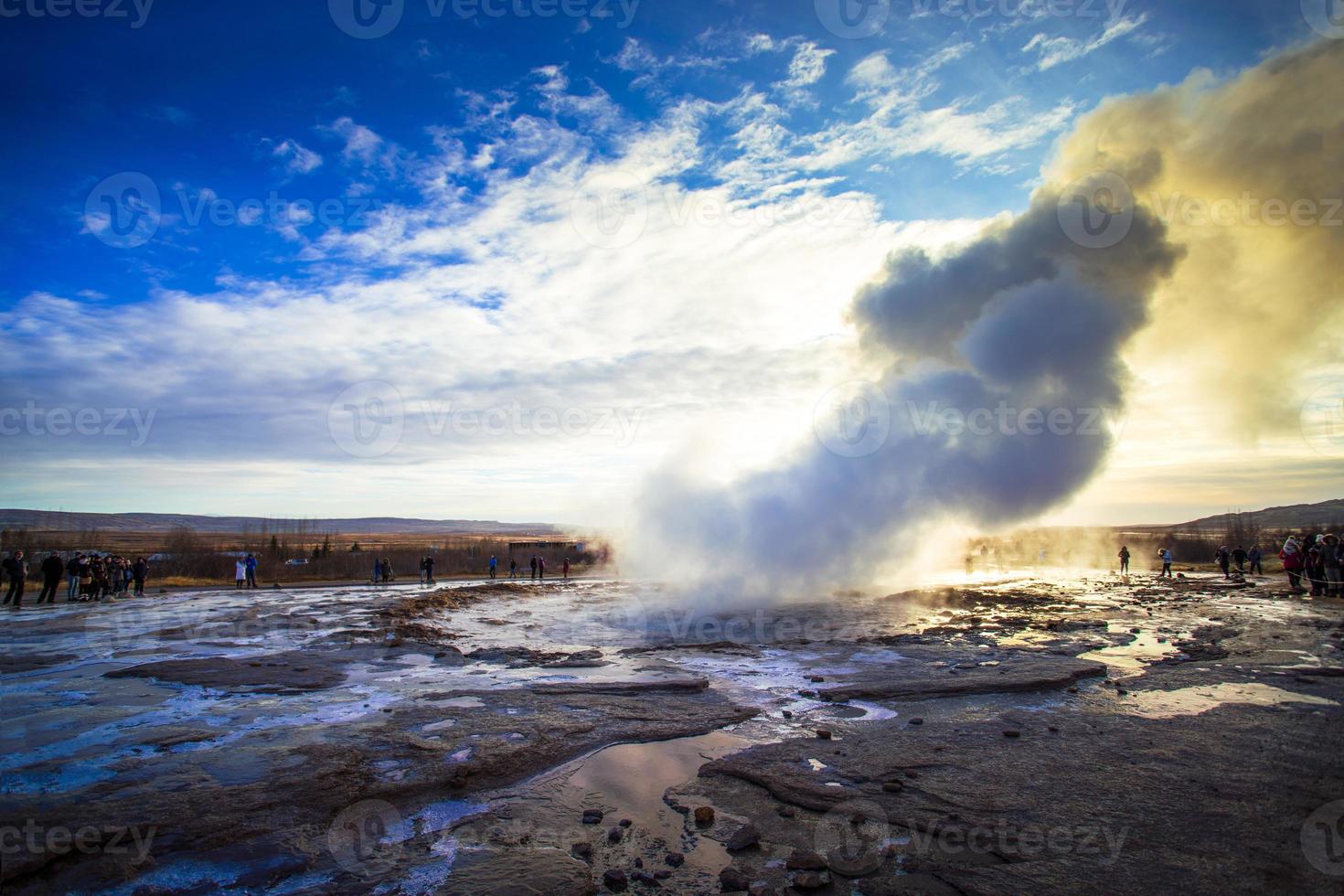 Strokkur, one of the most famous geysers located in a geothermal area beside the Hvita River in the southwest part of Iceland, erupting once every 6-10 minutes photo