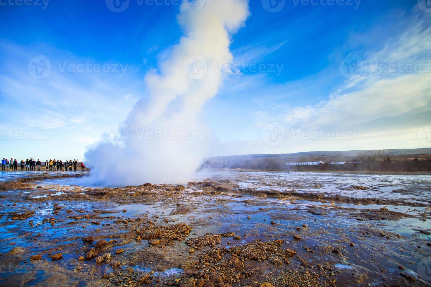 Strokkur, one of the most famous geysers located in a geothermal area beside the Hvita River in the southwest part of Iceland, erupting once every 6-10 minutes photo
