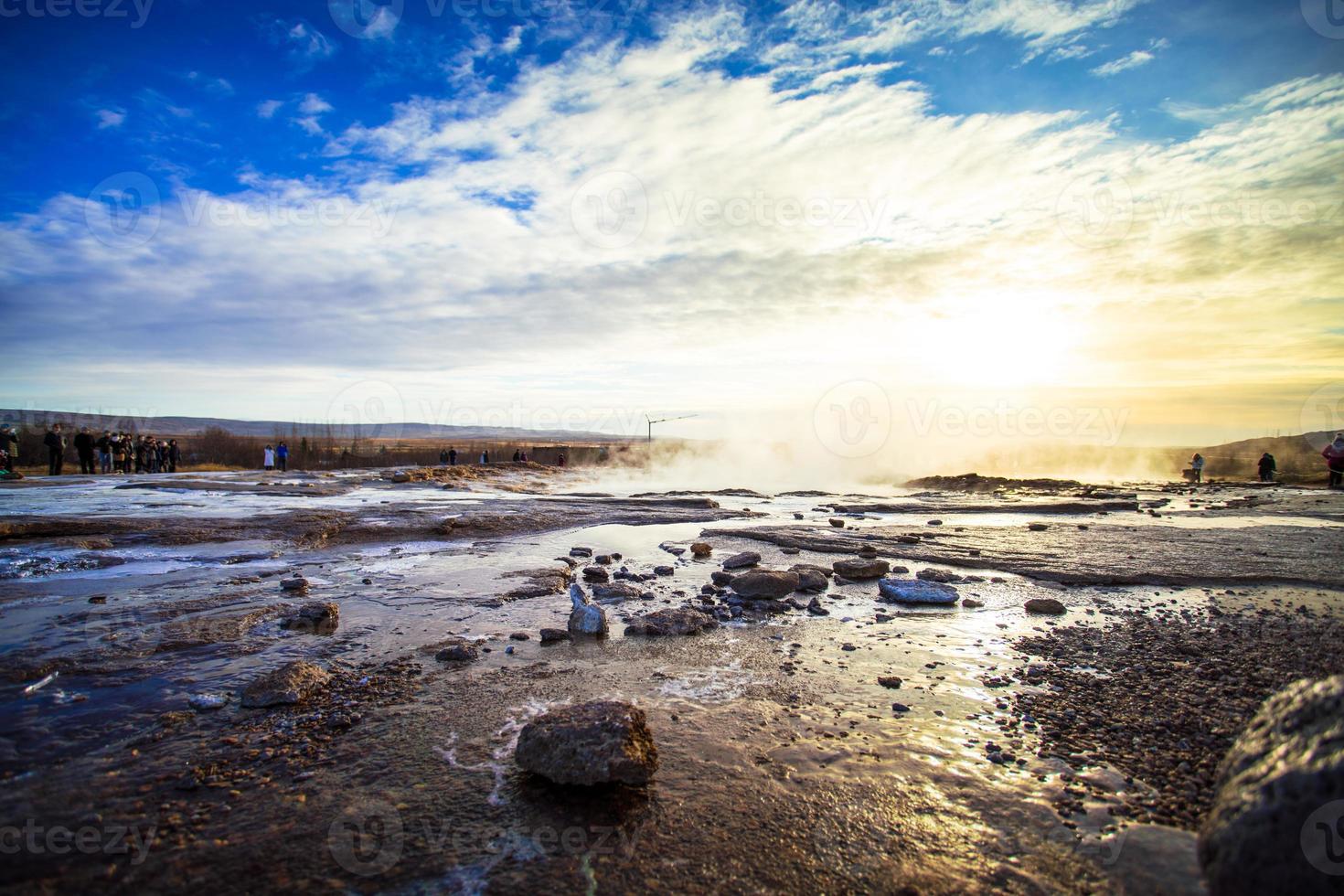 Strokkur, one of the most famous geysers located in a geothermal area beside the Hvita River in the southwest part of Iceland, erupting once every 6-10 minutes photo