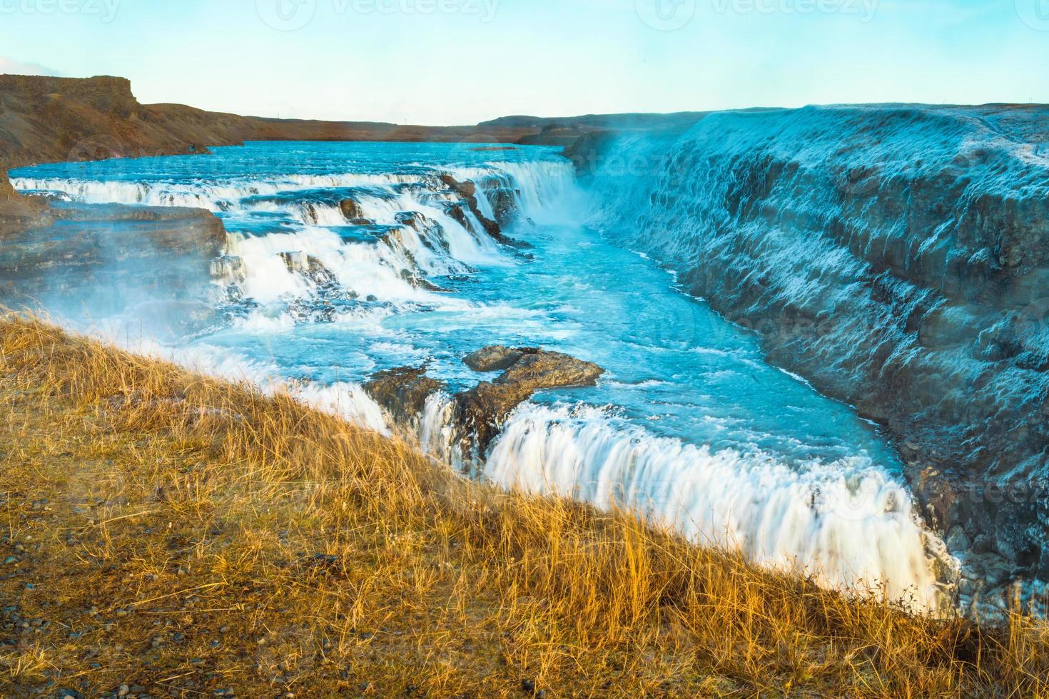 Gullfoss, or Golden Fall, a waterfall where is part of the Golden Circle located in the canyon of Olfusa river in southwest Iceland photo