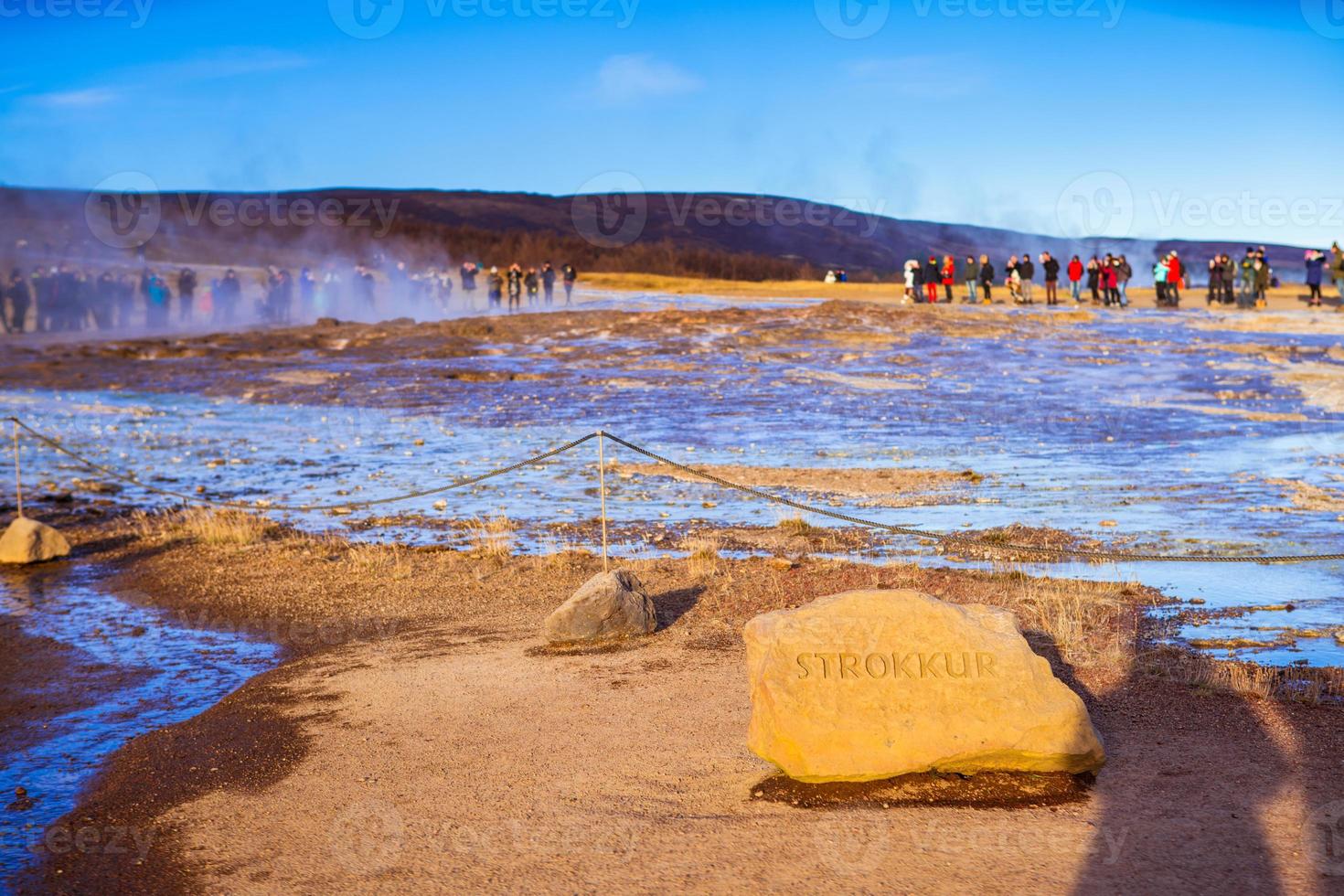 Strokkur, one of the most famous geysers located in a geothermal area beside the Hvita River in the southwest part of Iceland, erupting once every 6-10 minutes photo