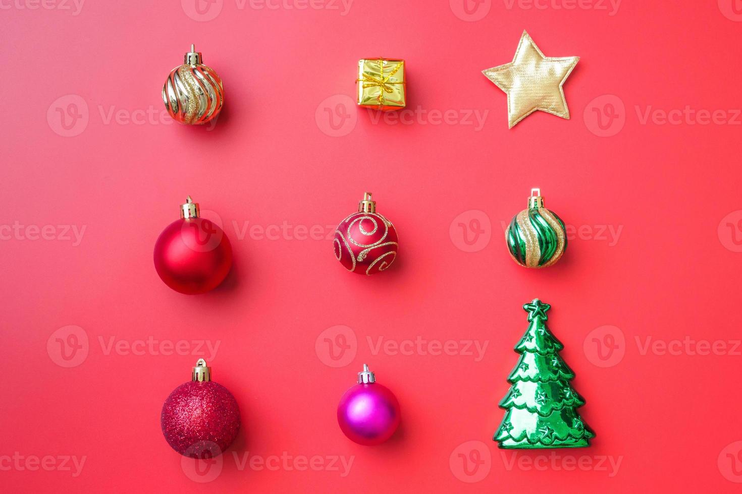 Christmas ball bauble pattern minimal flatlay on red background top view photo