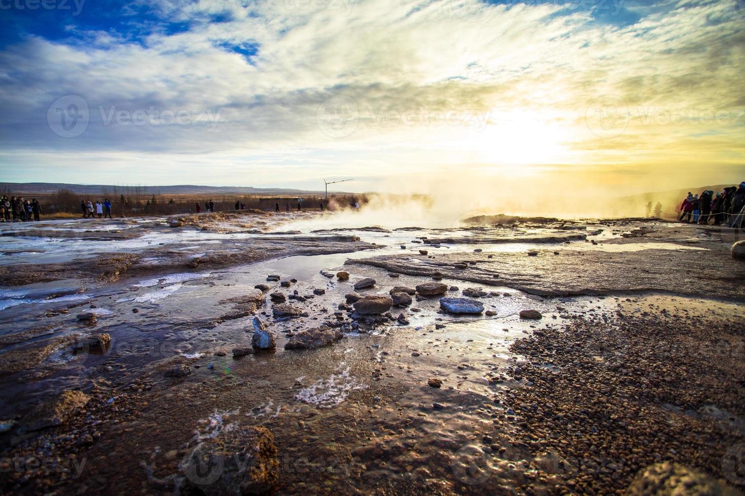 Strokkur, one of the most famous geysers located in a geothermal area beside the Hvita River in the southwest part of Iceland, erupting once every 6-10 minutes photo