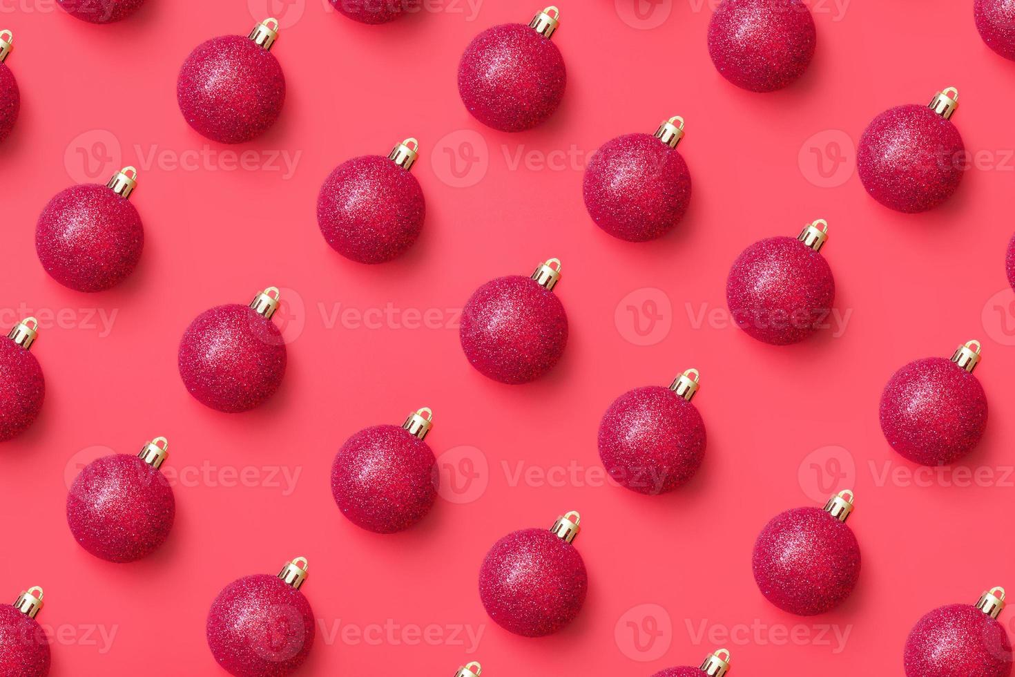 Christmas ball bauble pattern minimal flatlay on red background top view photo