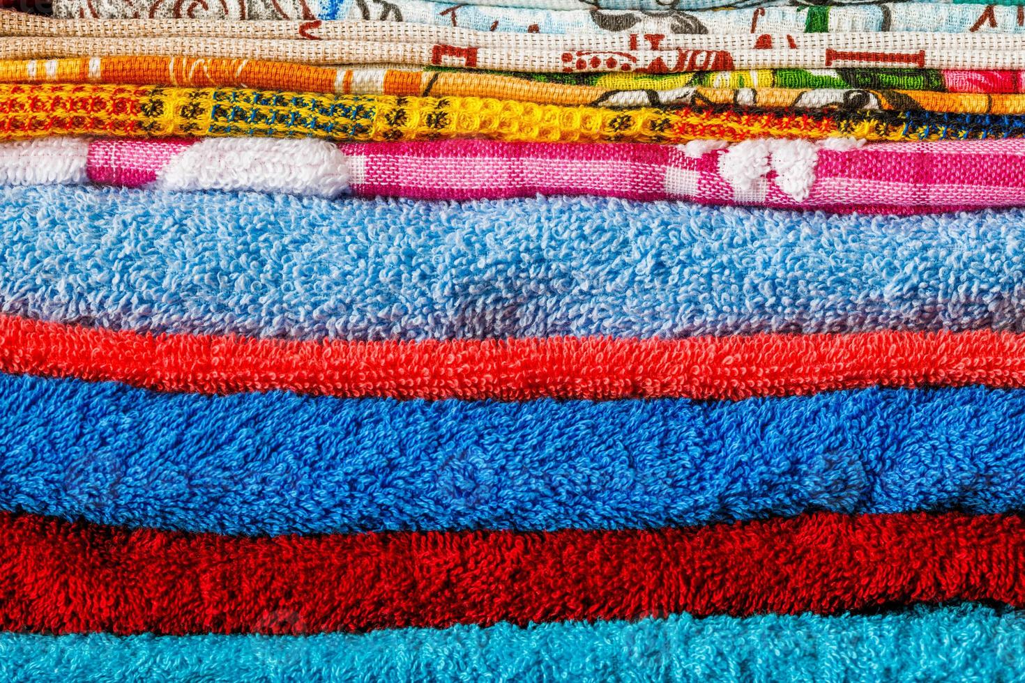stack of colored towels full frame close-up background photo