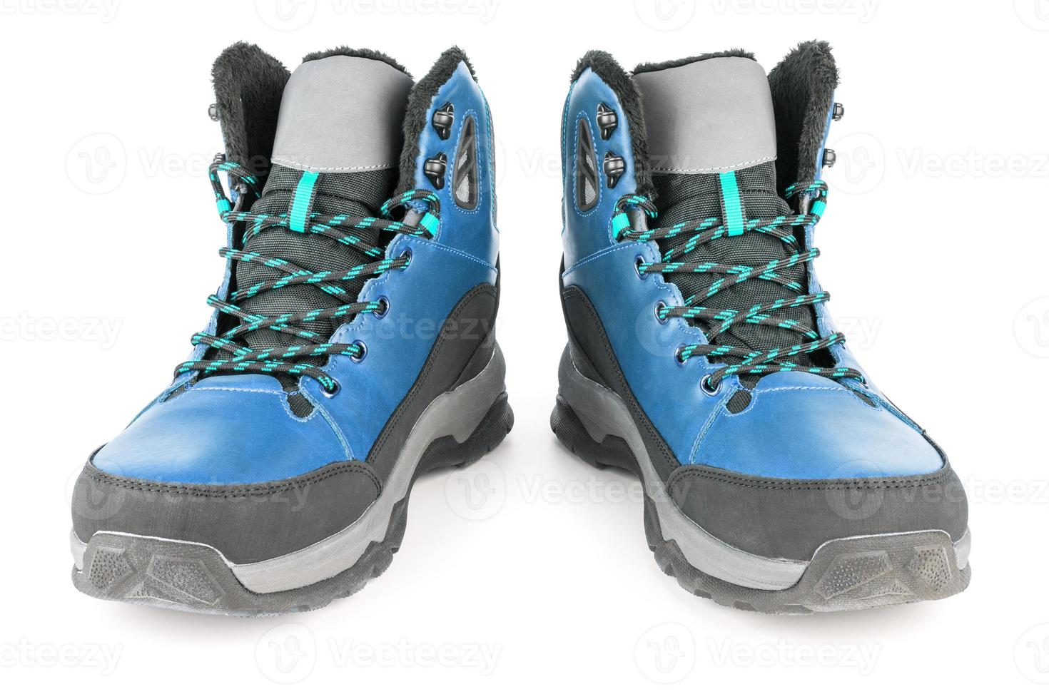 pair of mint blue insulated winter warm three quarter sneaker or boot isolated on white background photo