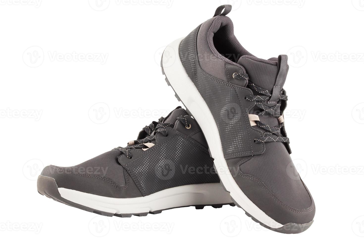 pair of black airmesh summer walking lightweight shoes isolated on white background photo