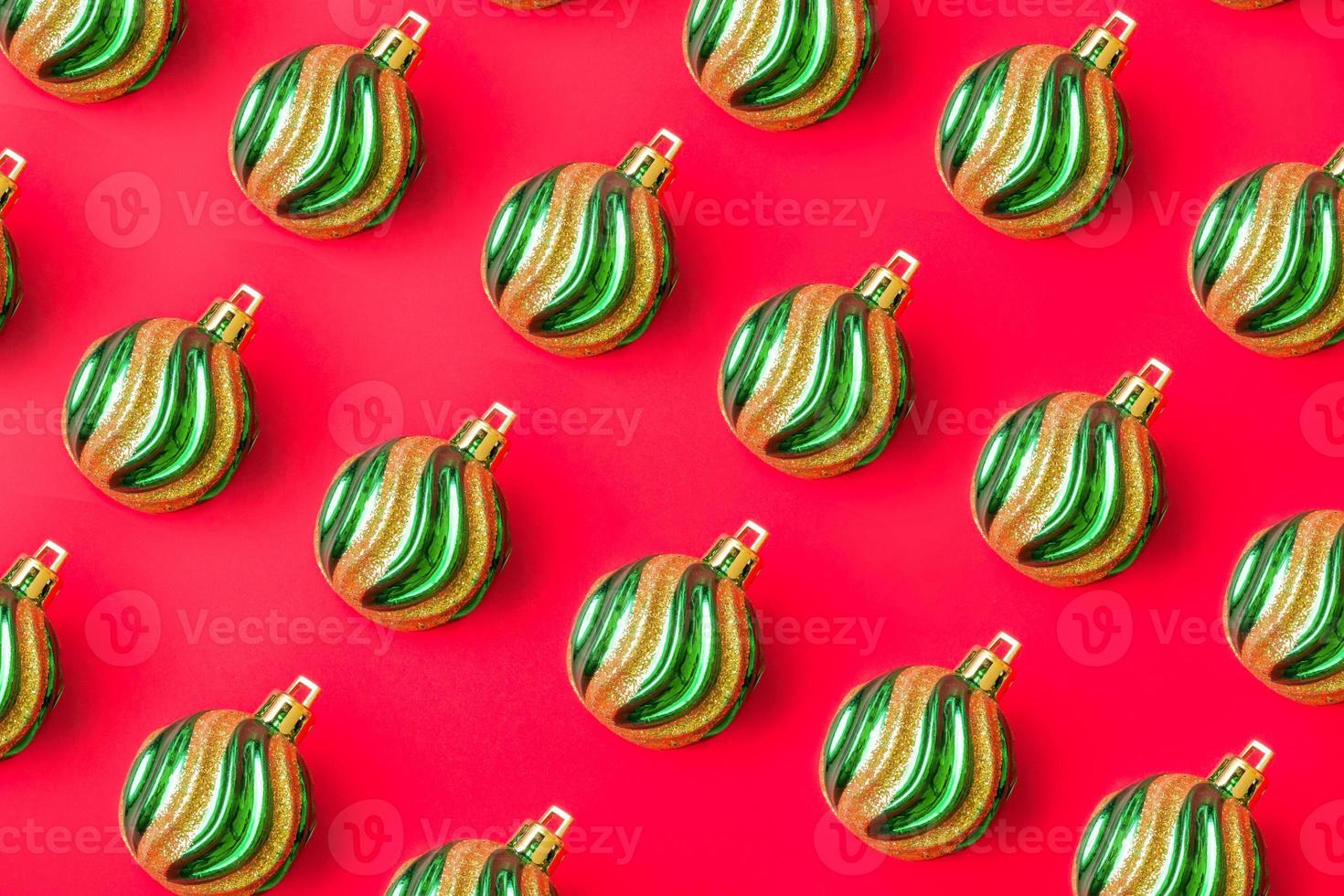 Christmas ball bauble pattern minimal flatlay on red background top view photo
