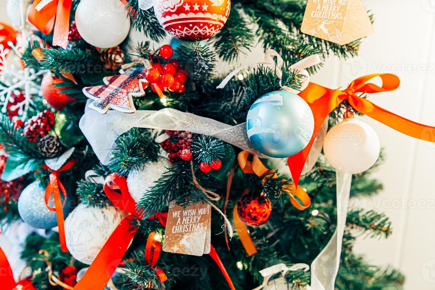 Classic Christmas New Year decorated New year tree with red and photo