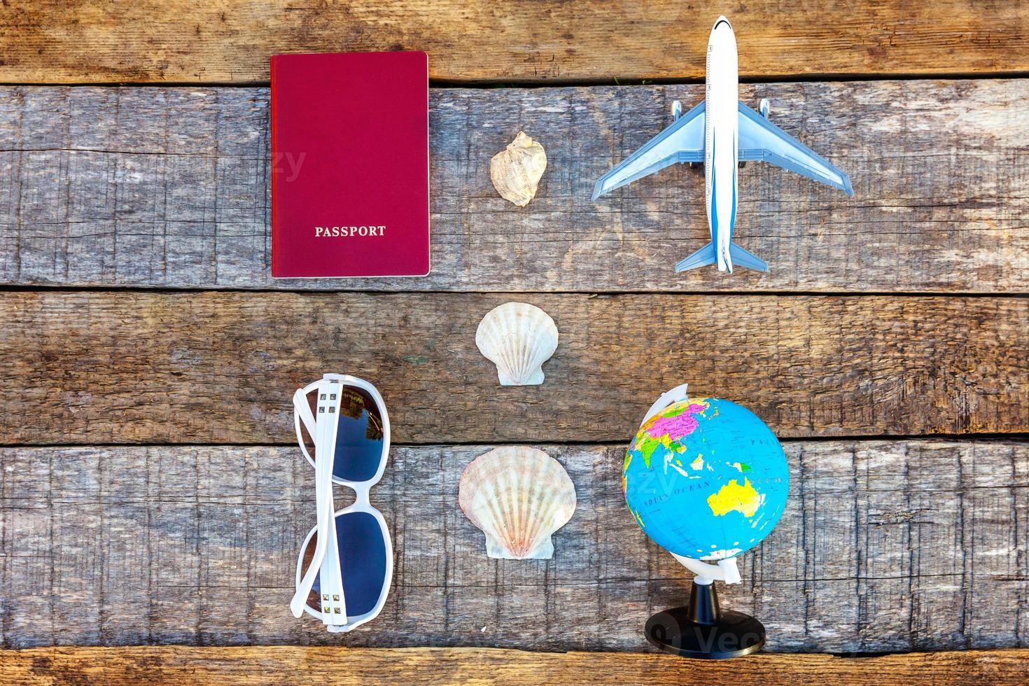 Concept of traveling on wooden background photo