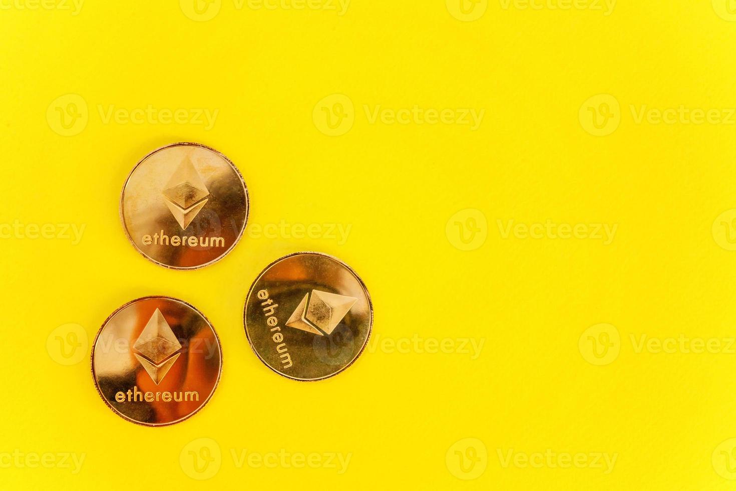 Ethereum, ETH, Crypto Coin on yellow background photo