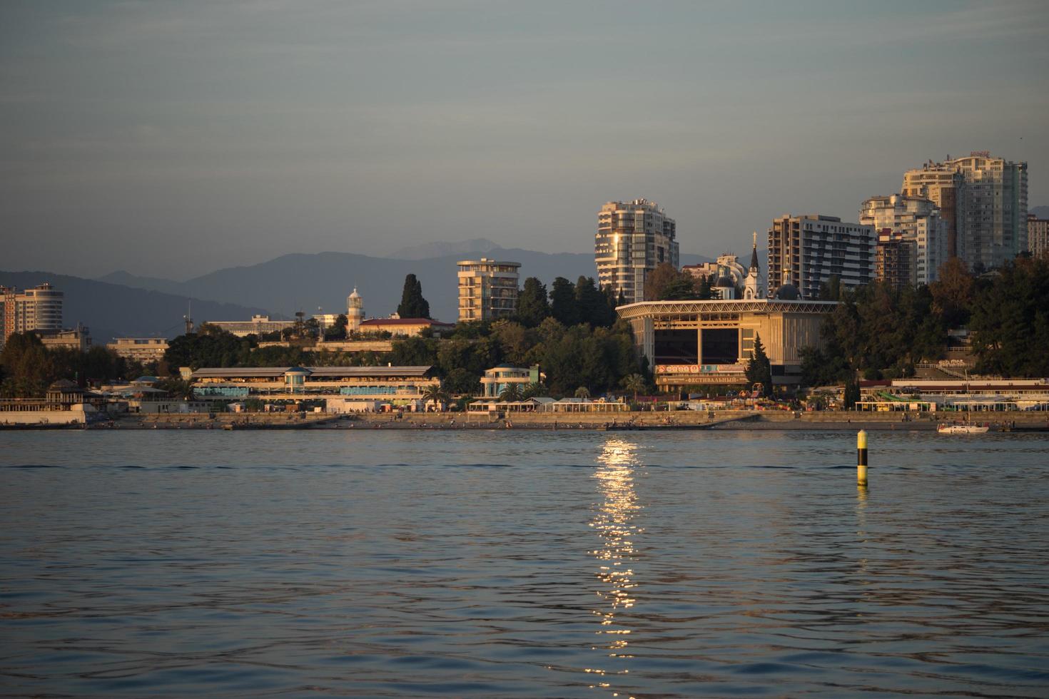 Sochi, Russia - October 8, 2010 Seascape with city view photo