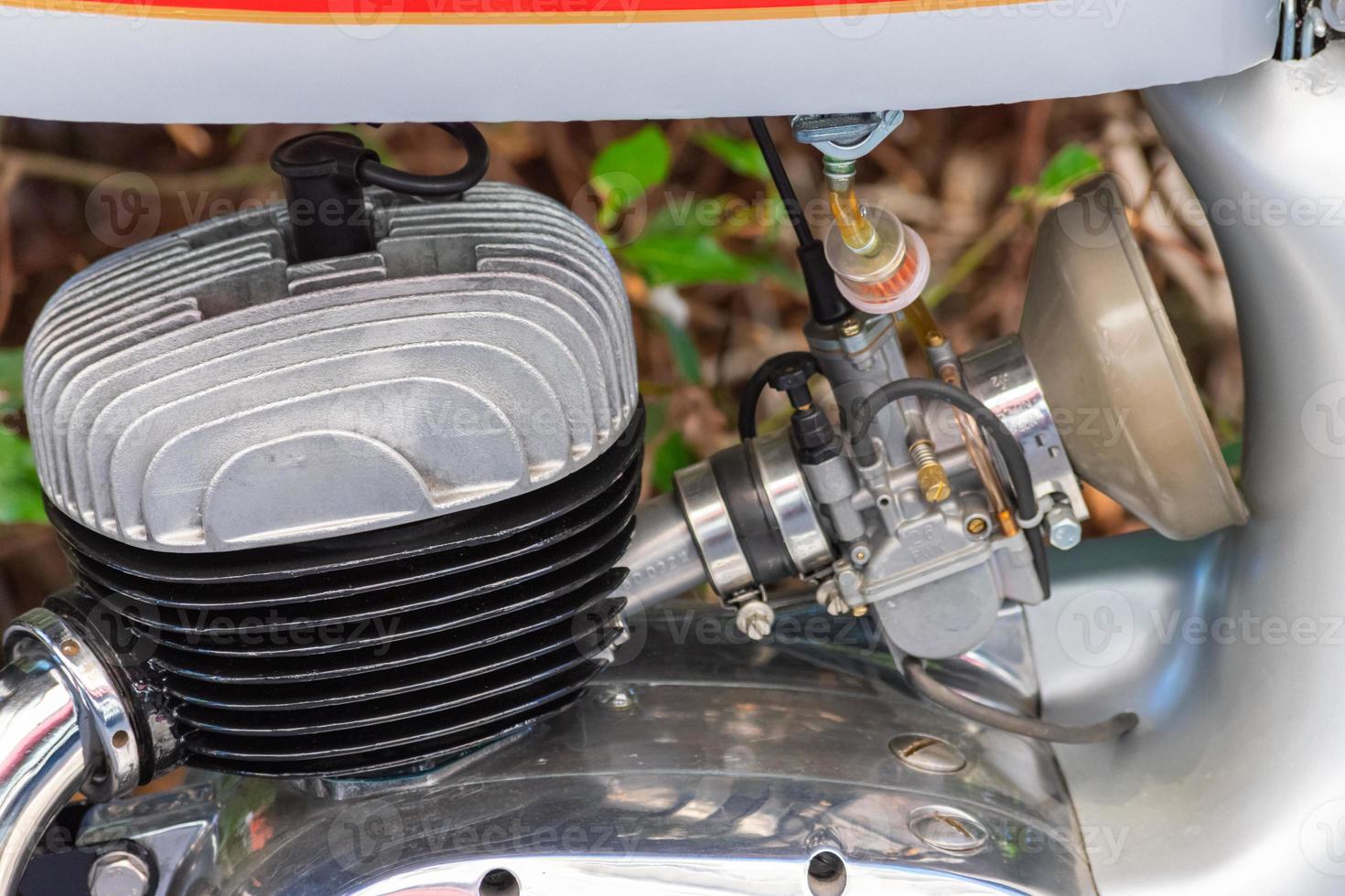 detail of the engine of a classic motorcycle photo