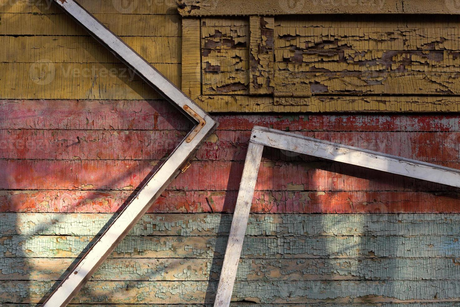Abstract composition with a frames on old wooden wall photo