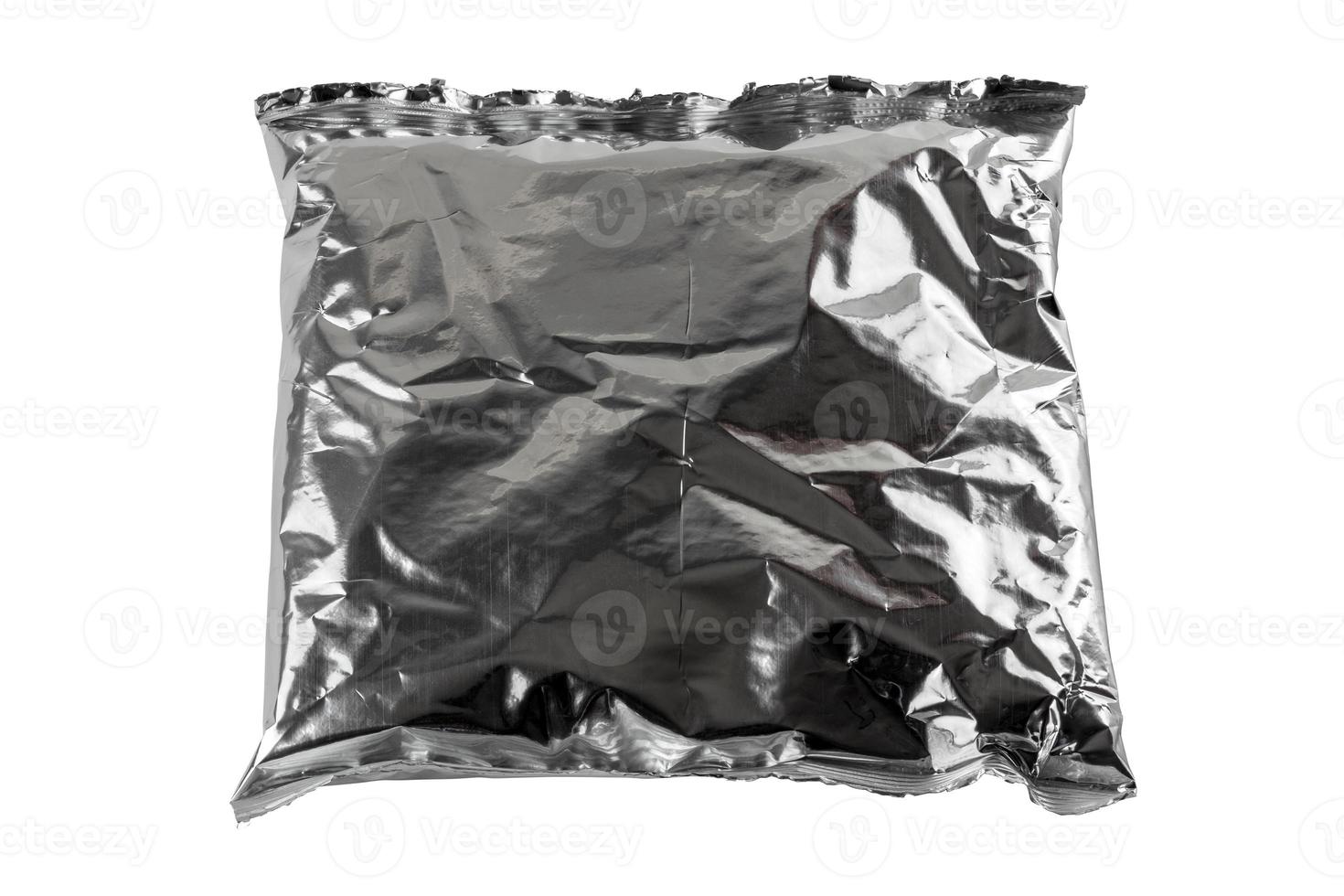 small blank single-use crumpled aluminum foiled plastic bag isolated on white background photo