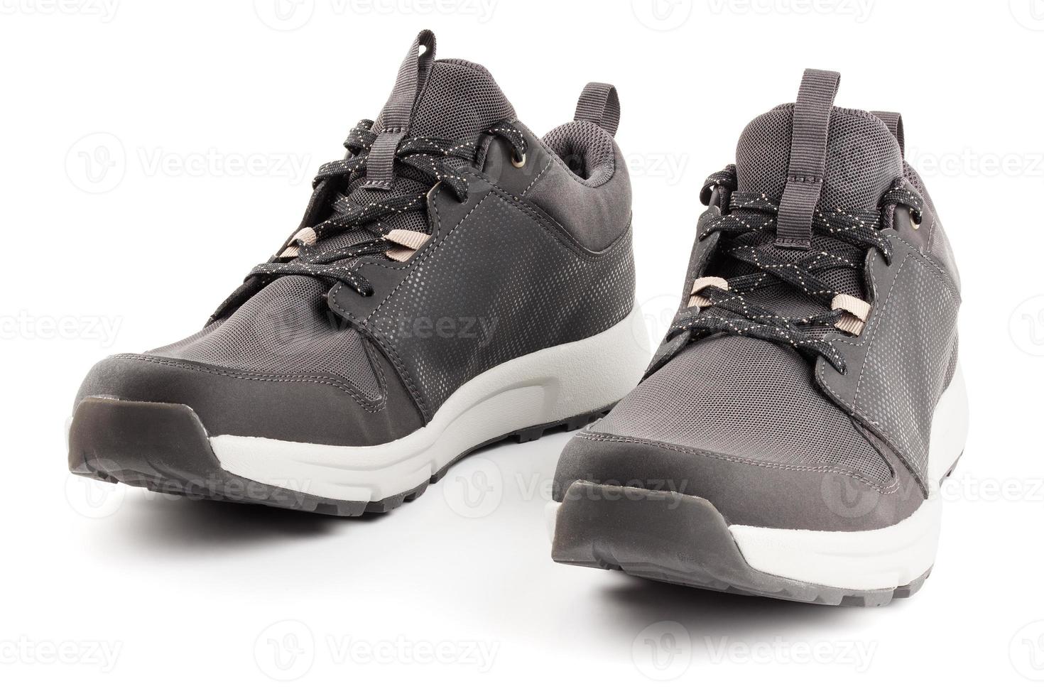 pair of black airmesh summer walking lightweight shoes isolated on white background photo