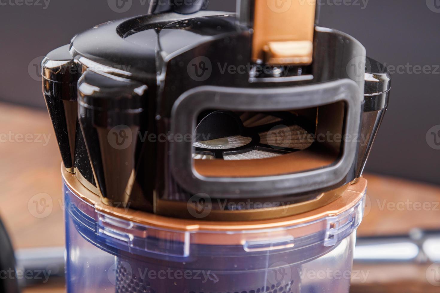 bagless vacuum cleaner tube with HEPA filter inside, close-up, selective focus photo