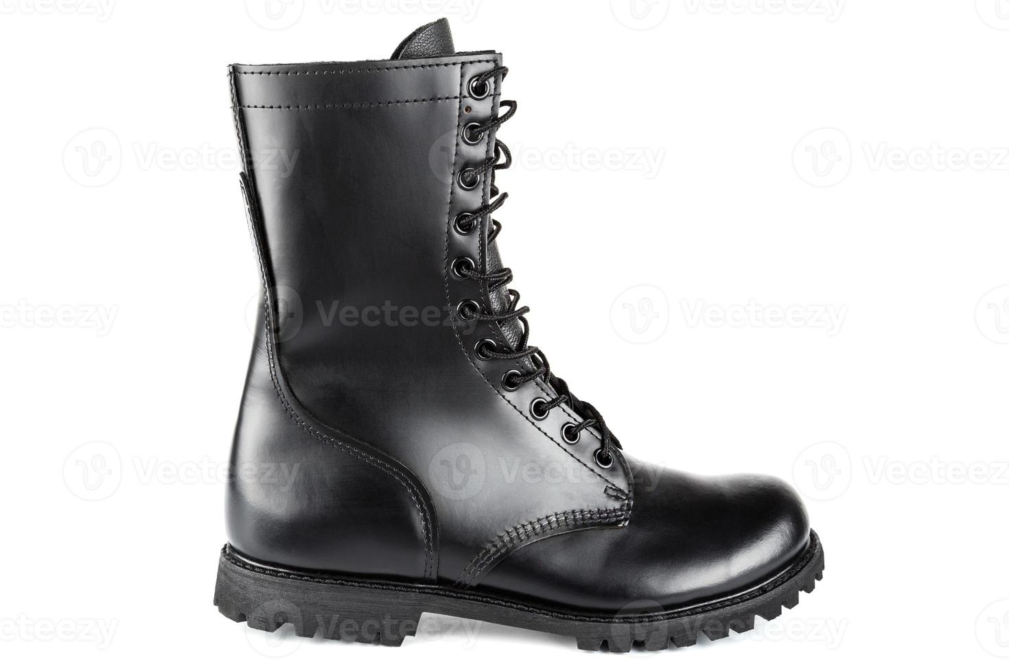 side view of black leather 10-inch new black military combat boot, isolated on white background photo
