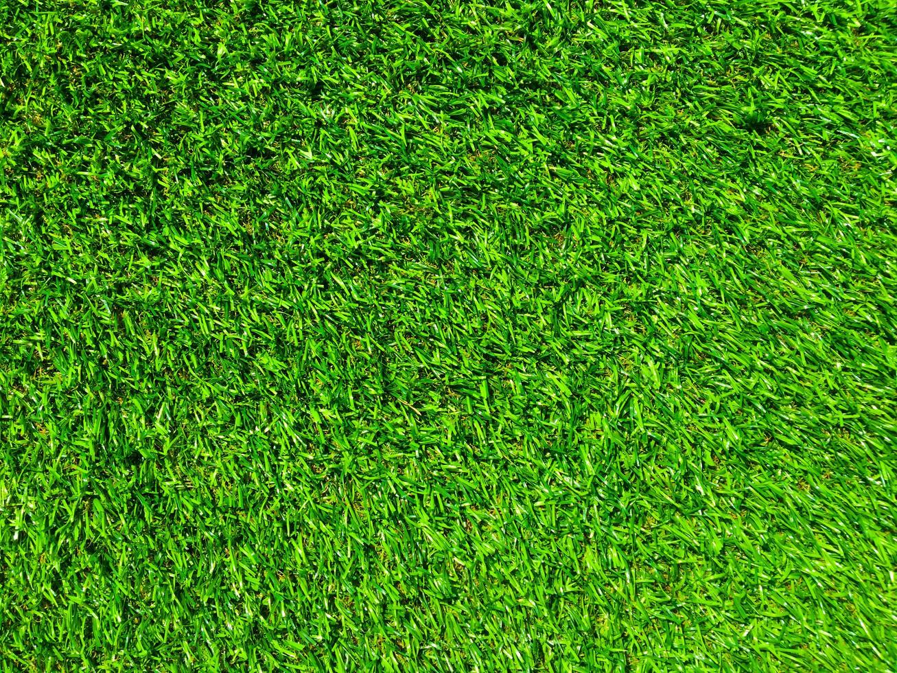 Artificial green grass texture background with copy space for work and design. photo