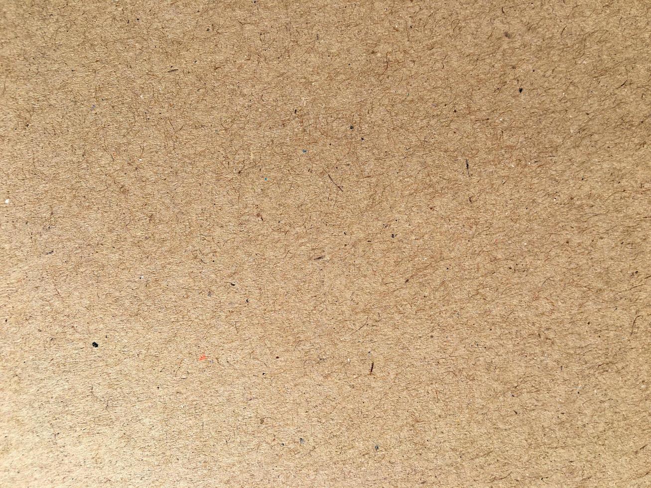 Old brown paper texture background or cardboard with copy space for design. photo