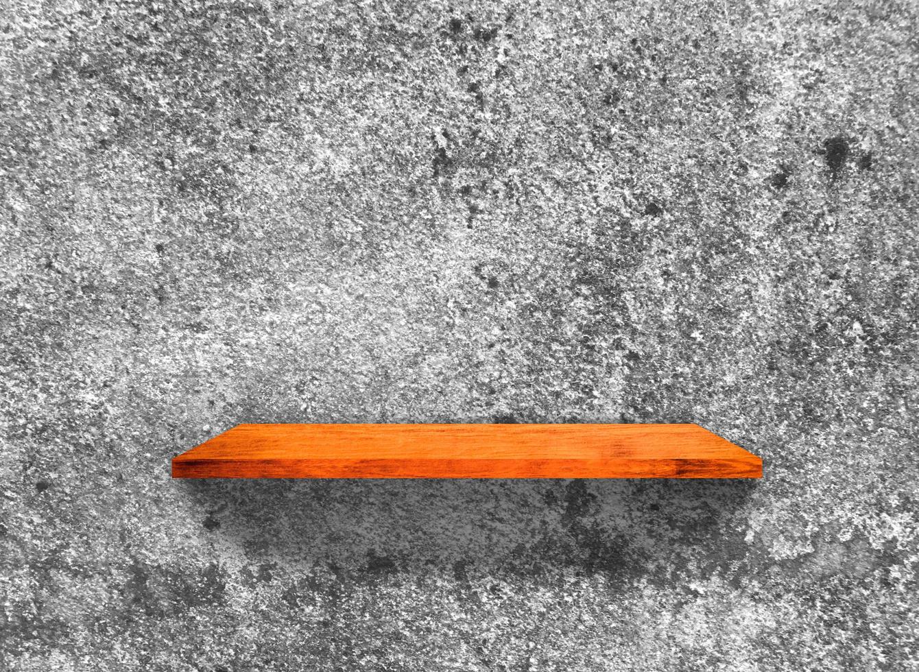 Rustic wooden shelf on grey concrete wall texture background with clipping path. pattern wallpaper photo