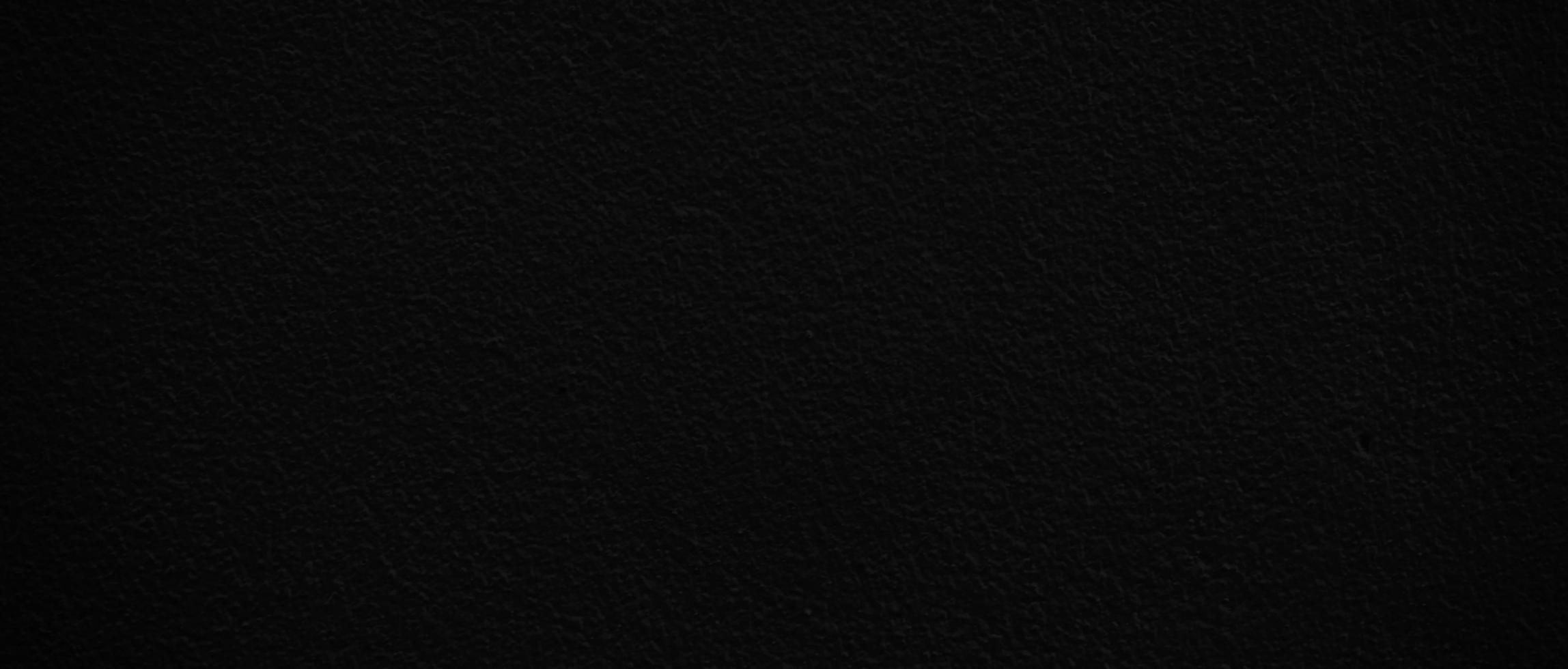 Blank black cement wall texture for background with copy space for design photo