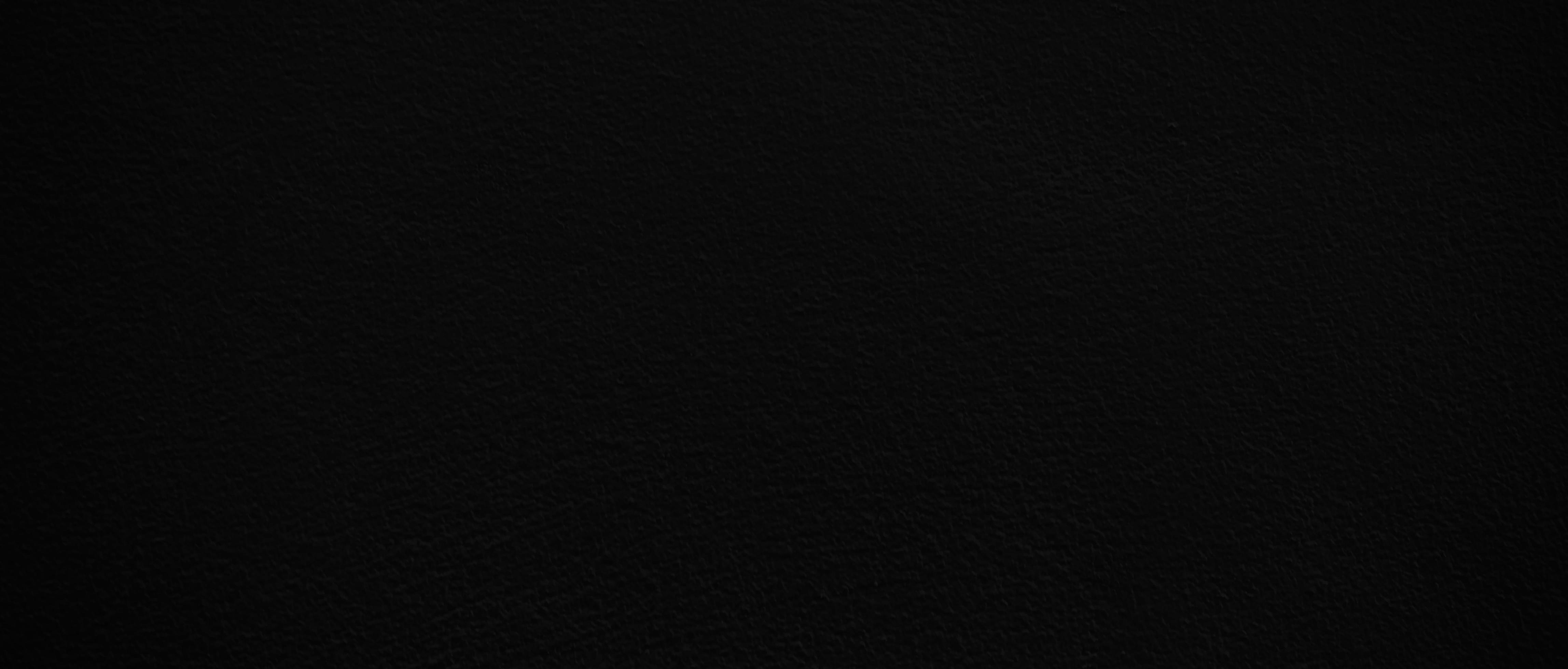 Blank black cement wall texture for background with copy space for