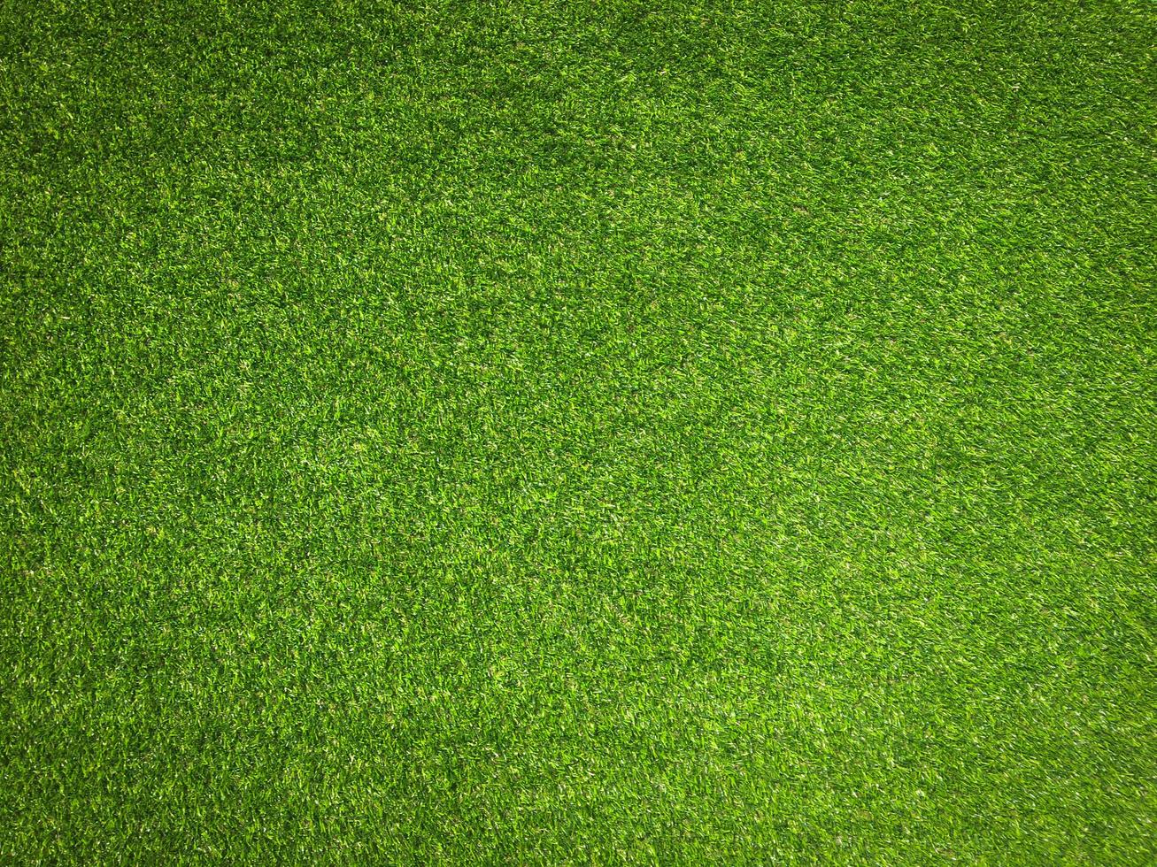 Artificial grass background for design, top view photo