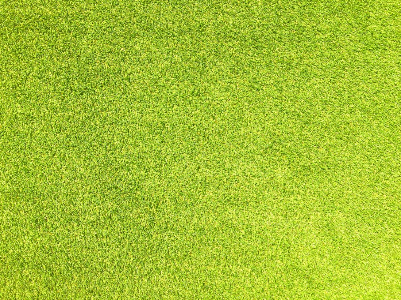 Artificial grass background for design, top view photo