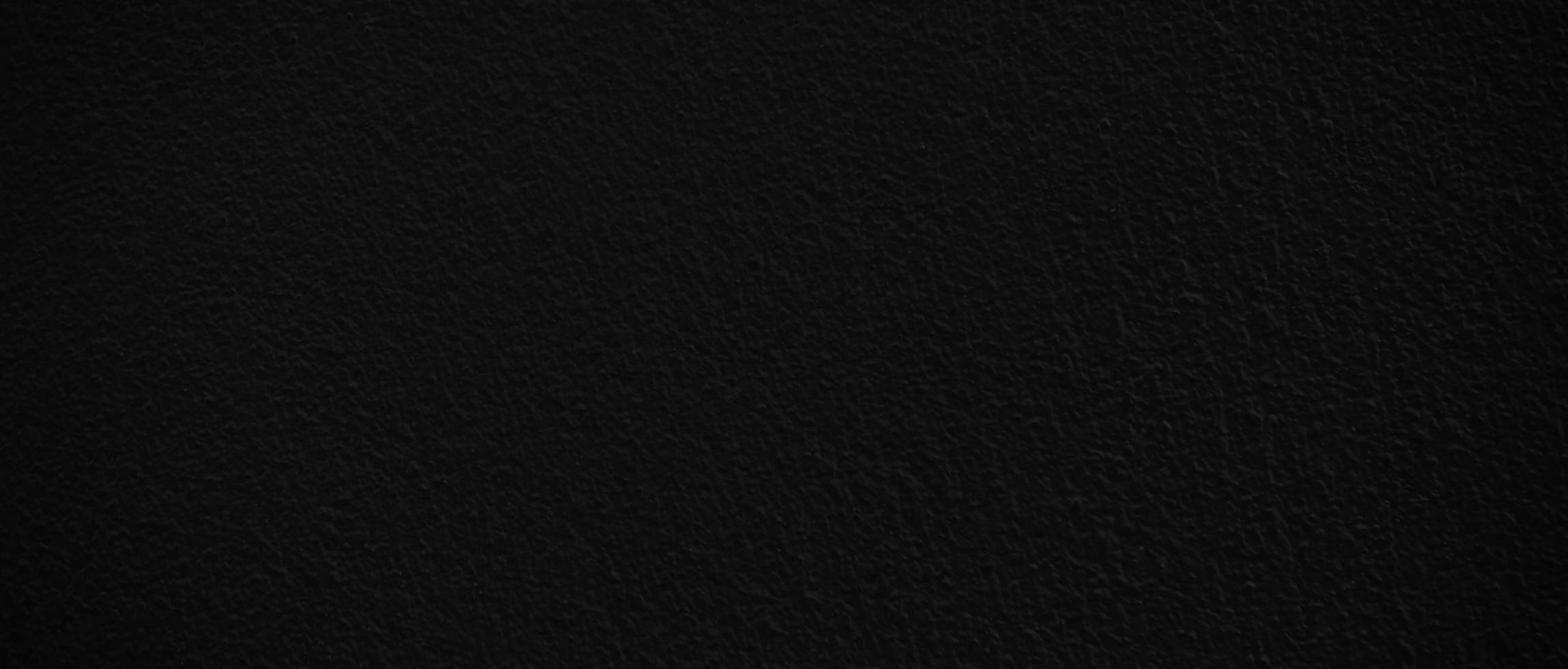 Blank black cement wall texture for background with copy space for design photo