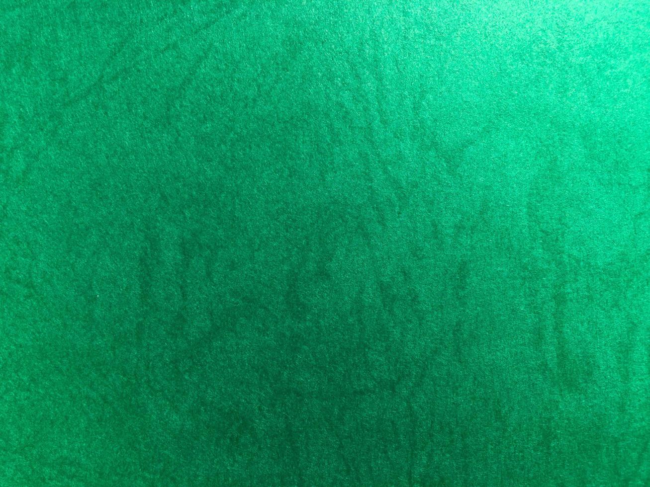 Green paper texture background with pattern for design. Copy space for text and work photo