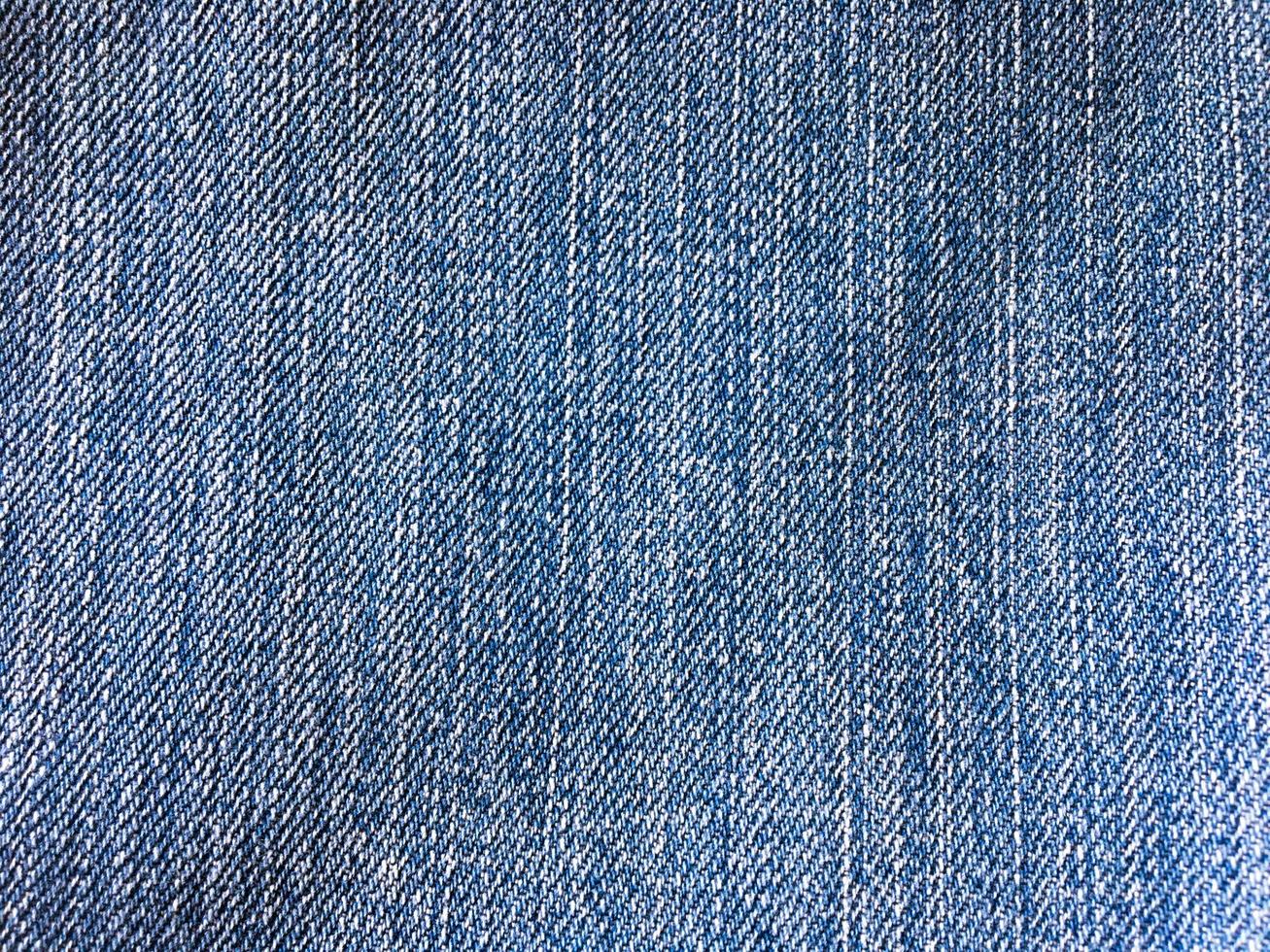 Top view of blue jeans texture background with copy space for design or text photo