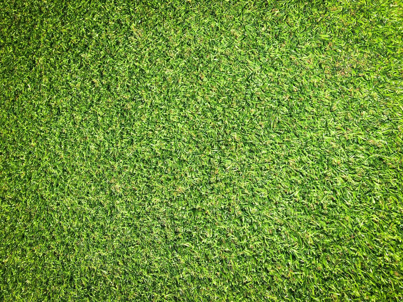 Beautiful green grass pattern from golf course for background. Copy space for work and design, Top view photo